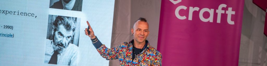 Photo of Alex while giving a talk